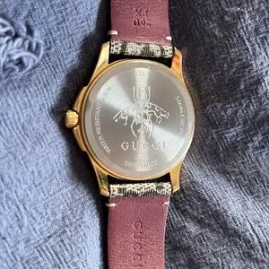 Here we have a beautiful Gucci watch, part of G-timeless collection. Gucci G-Timeless Planetarium Watches | aBlogtoWatch main image 4